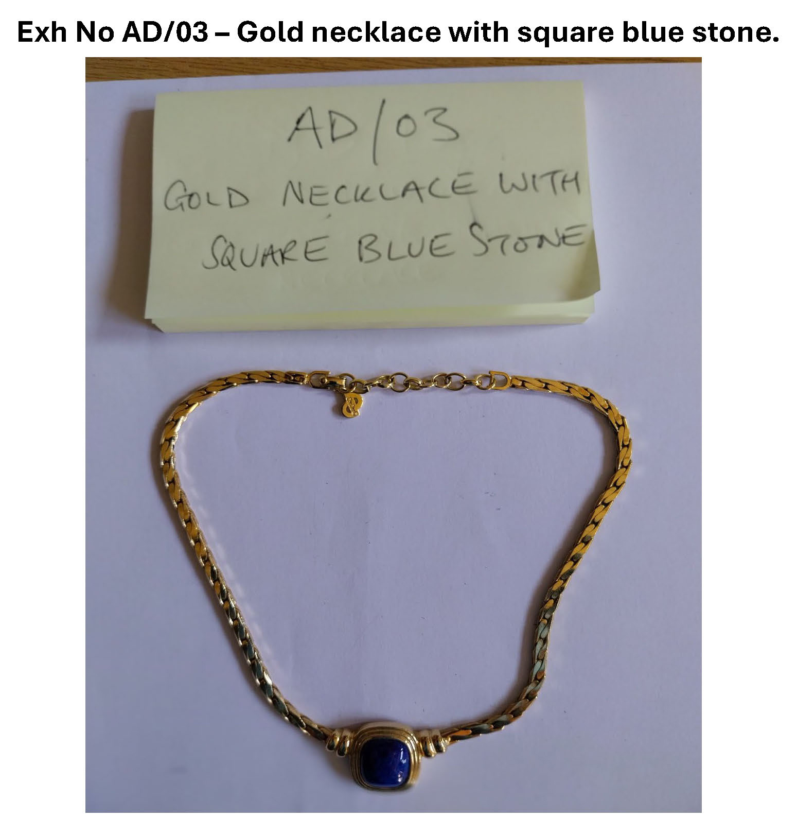 AD03 Gold necklace with square blue stone.jpg