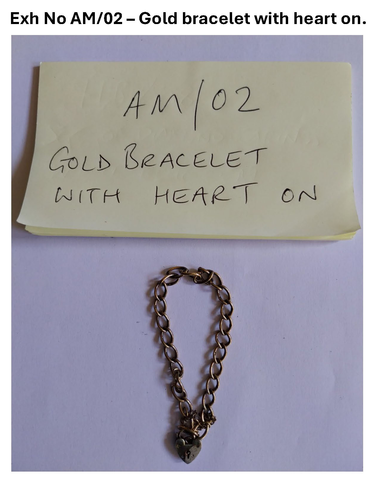 AM02 Gold bracelet with heart.jpg