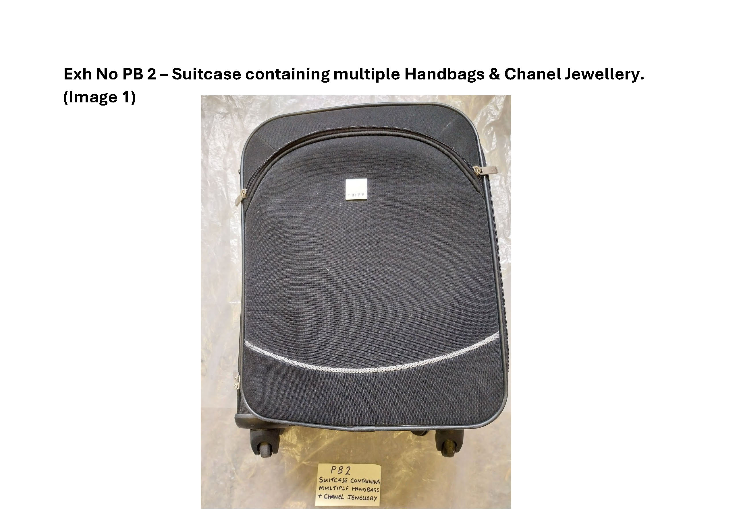 PB2 Suitcase containing multiple handbags and Chanel jewellery 1.jpg