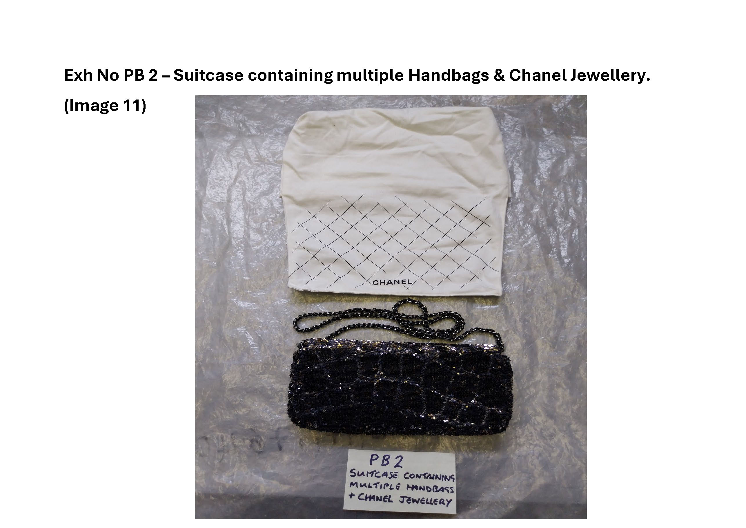 PB2 Suitcase containing multiple handbags and Chanel jewellery 11.jpg