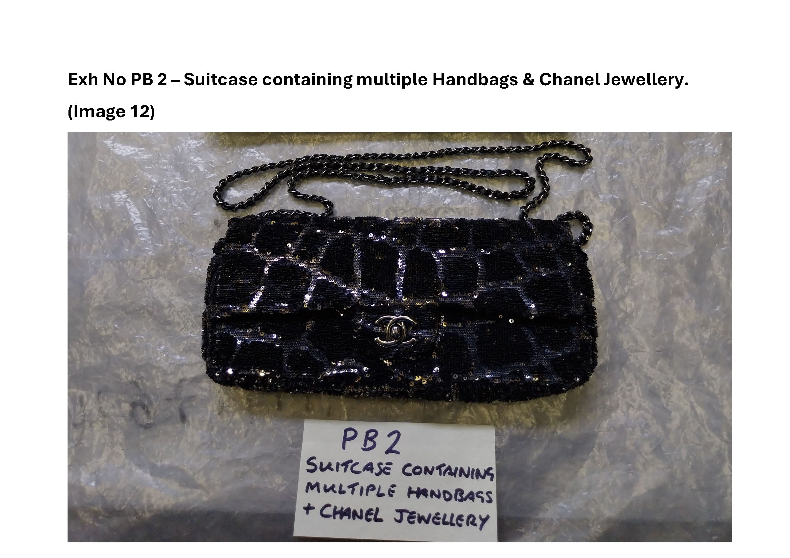 PB2 Suitcase containing multiple handbags and Chanel jewellery 12.jpg