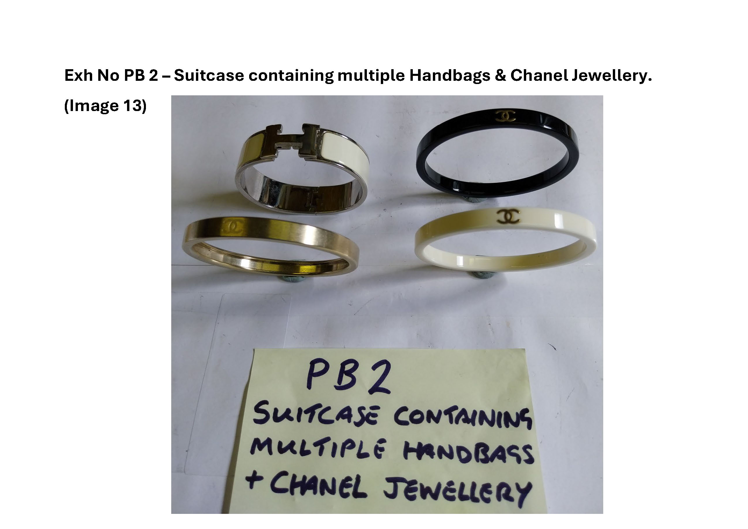 PB2 Suitcase containing multiple handbags and Chanel jewellery 13.jpg