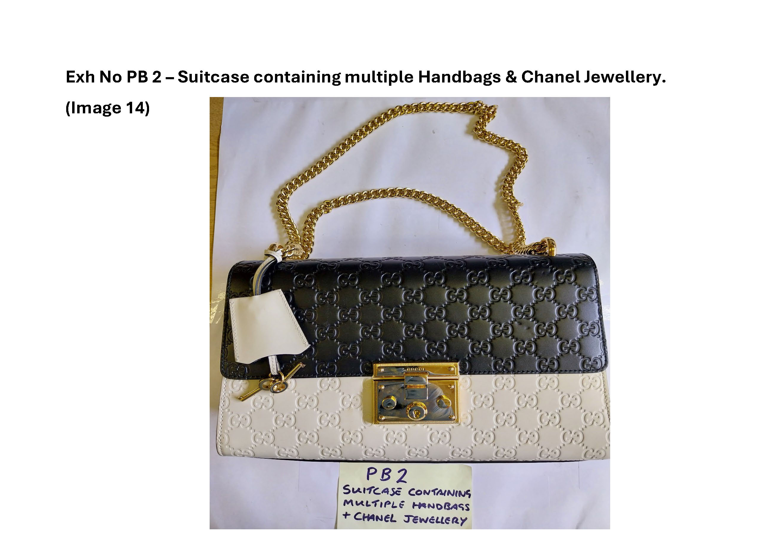 PB2 Suitcase containing multiple handbags and Chanel jewellery 14.jpg