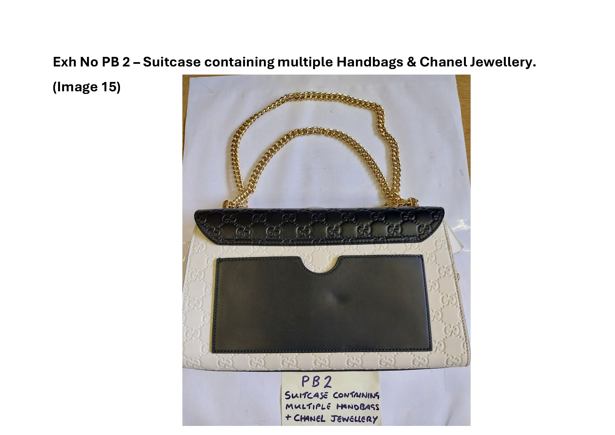 PB2 Suitcase containing multiple handbags and Chanel jewellery 15.jpg