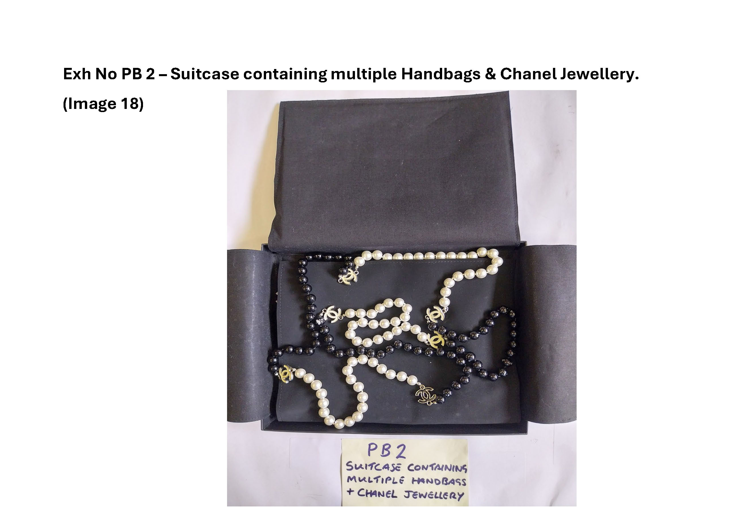PB2 Suitcase containing multiple handbags and Chanel jewellery 18.jpg