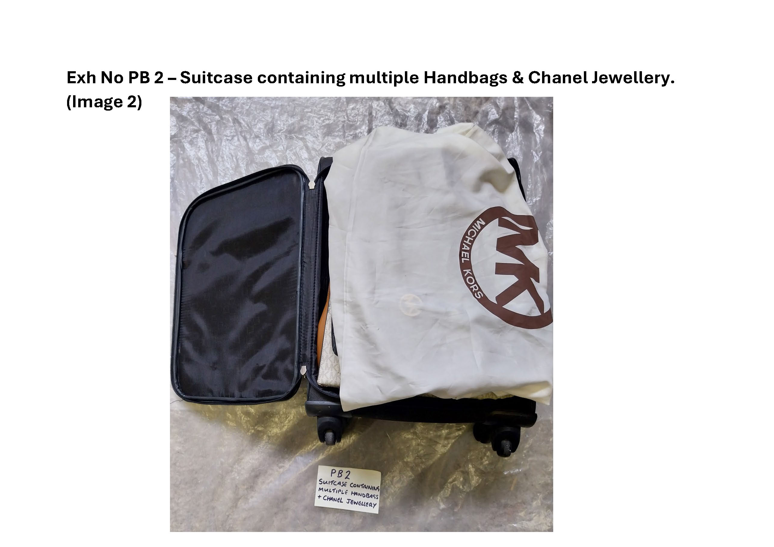 PB2 Suitcase containing multiple handbags and Chanel jewellery 2.jpg