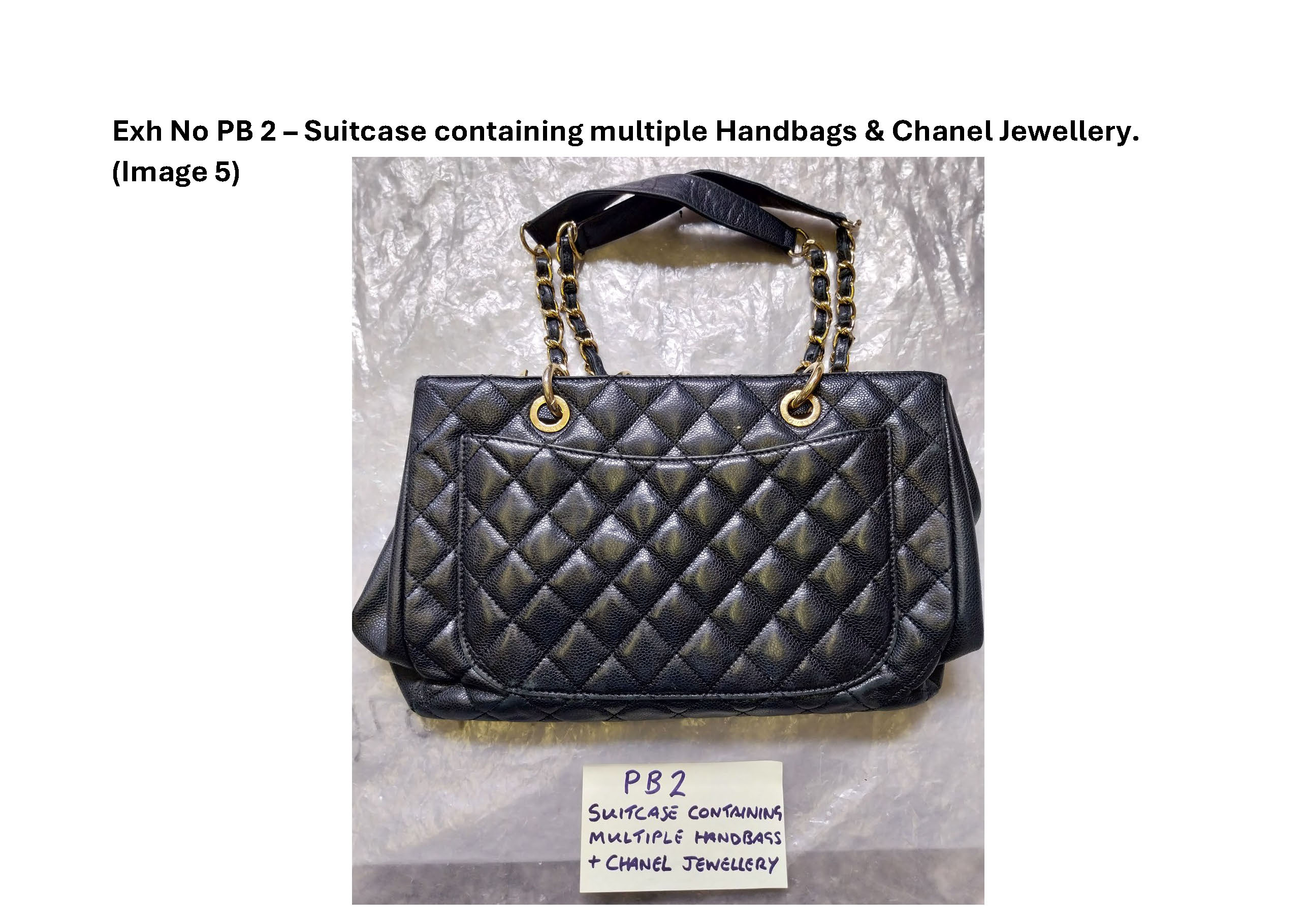 PB2 Suitcase containing multiple handbags and Chanel jewellery 5.jpg