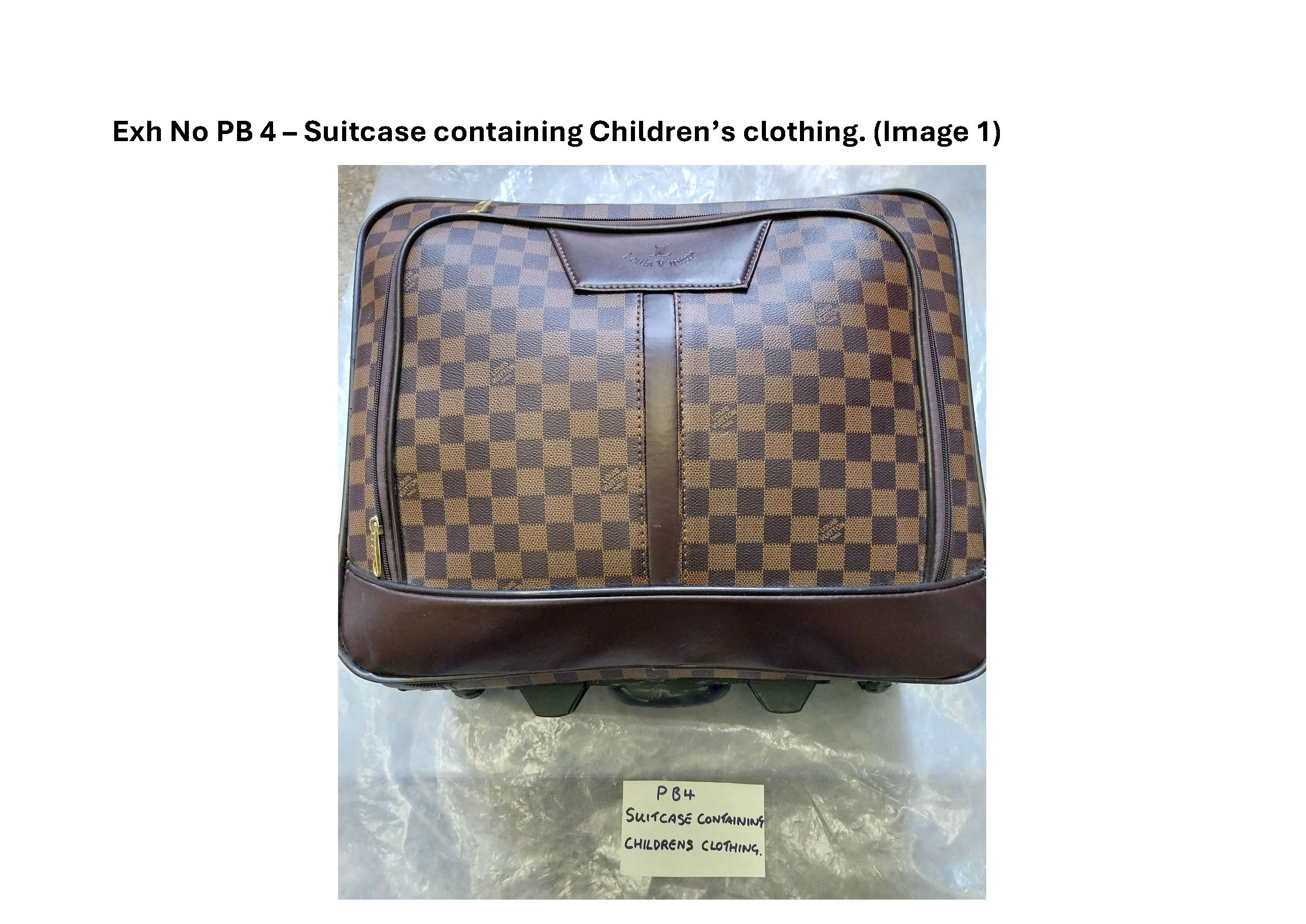 PB4 suitcase containing childrens clothing 1.jpg