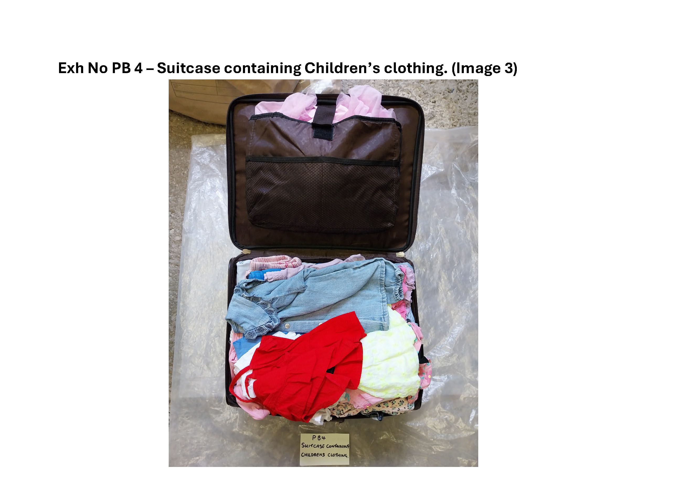 PB4 suitcase containing childrens clothing 3.jpg
