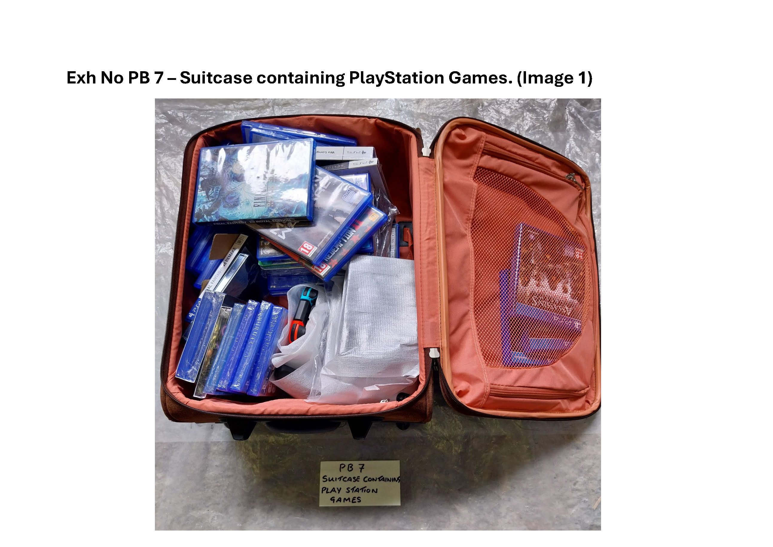 PB7 Suitcase containing Playstation games and controllers 1.jpg