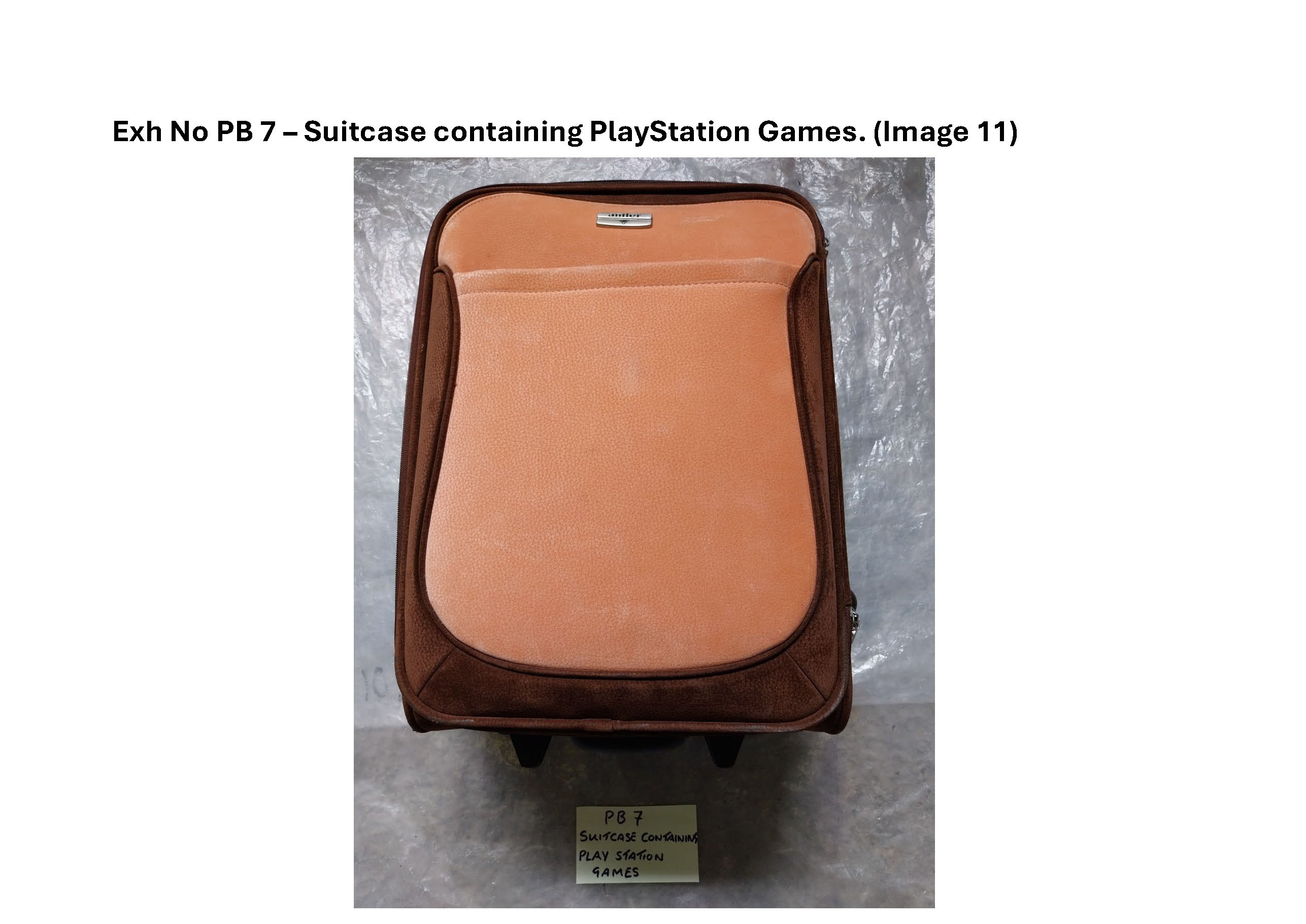 PB7 Suitcase containing Playstation games and controllers 10.jpg