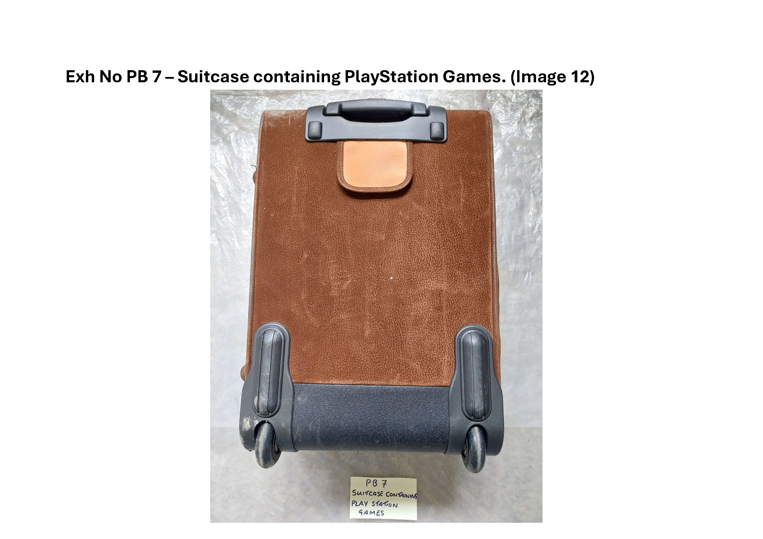 PB7 Suitcase containing Playstation games and controllers 11.jpg