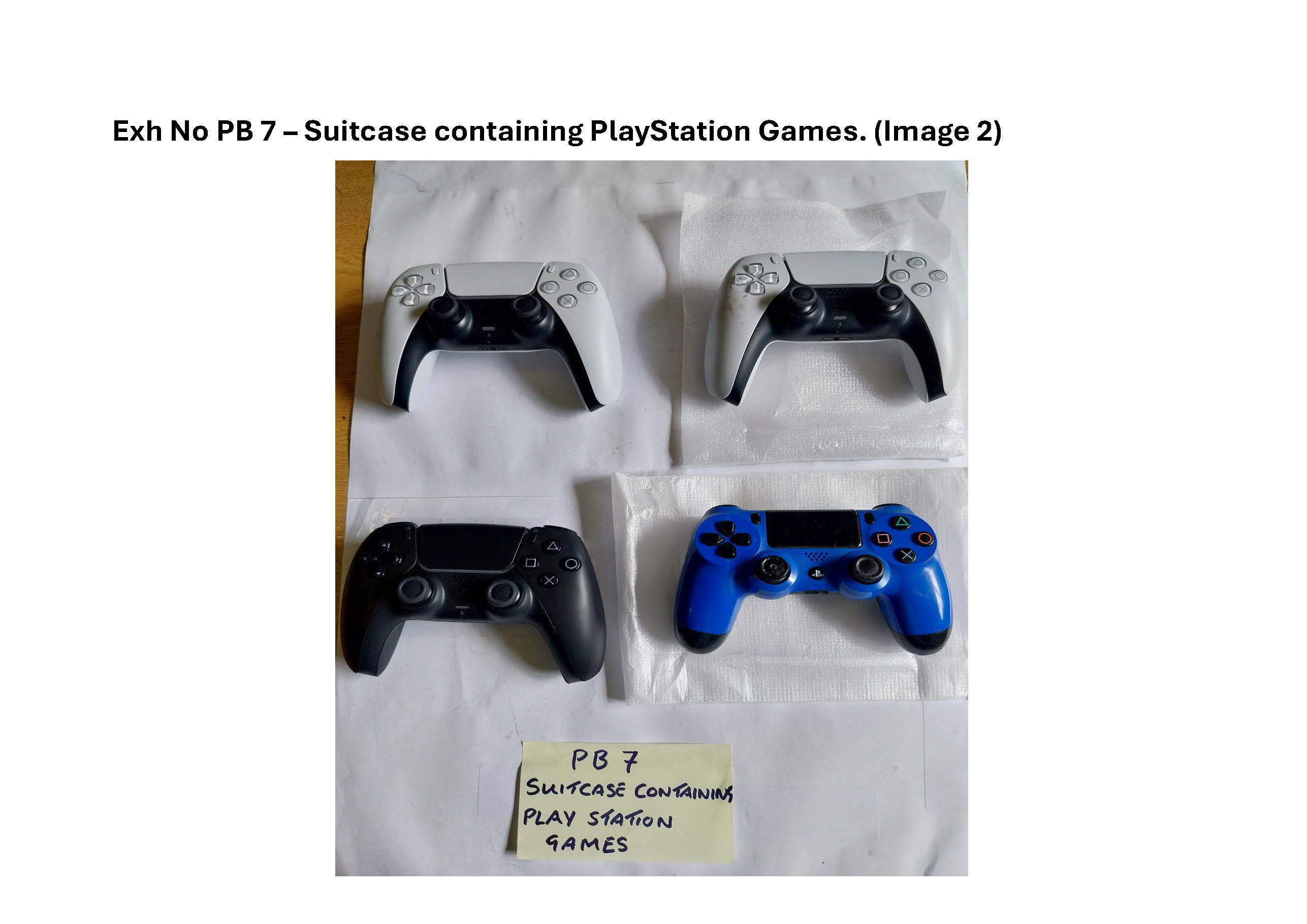PB7 Suitcase containing Playstation games and controllers 2.jpg