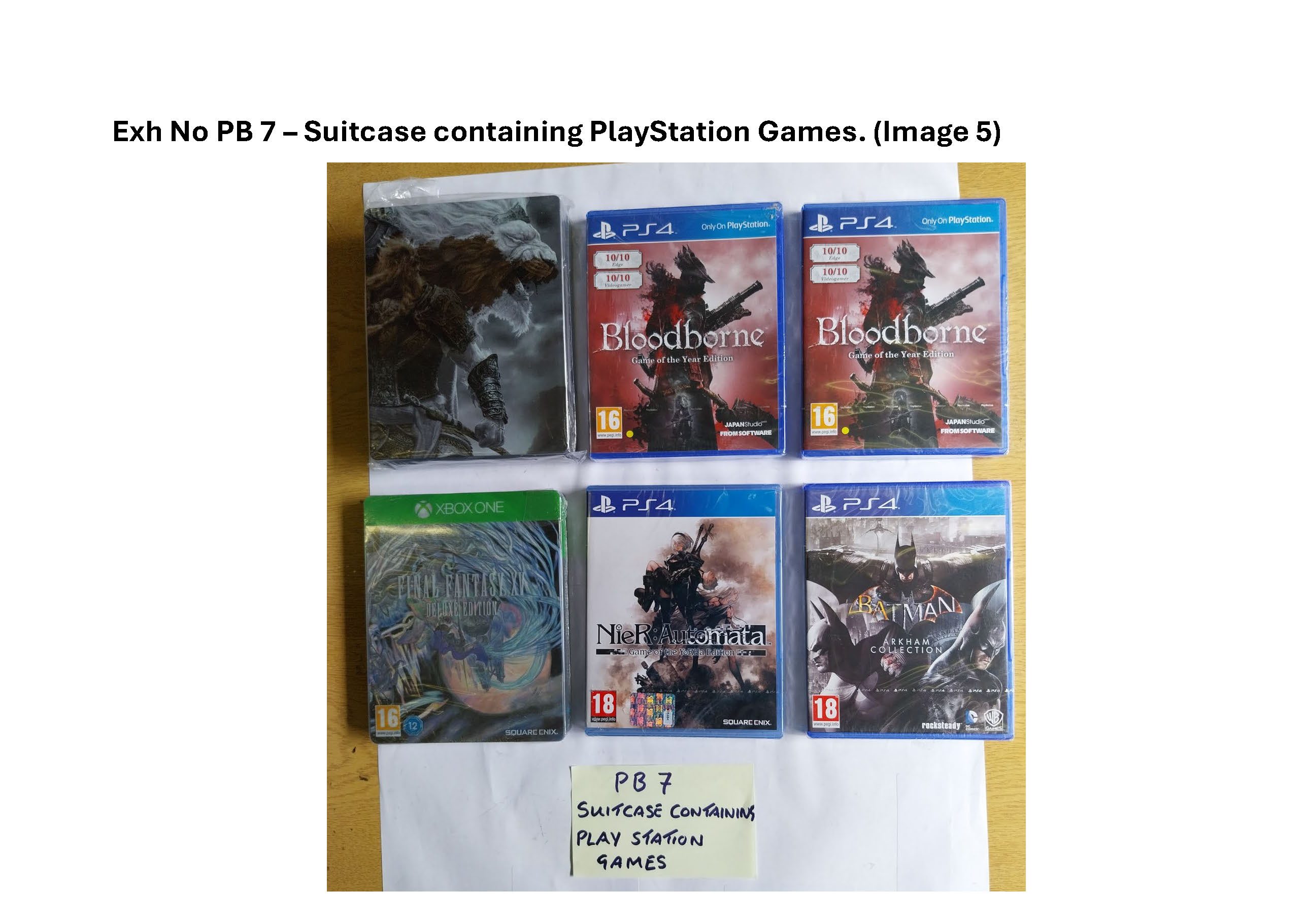 PB7 Suitcase containing Playstation games and controllers 4.jpg
