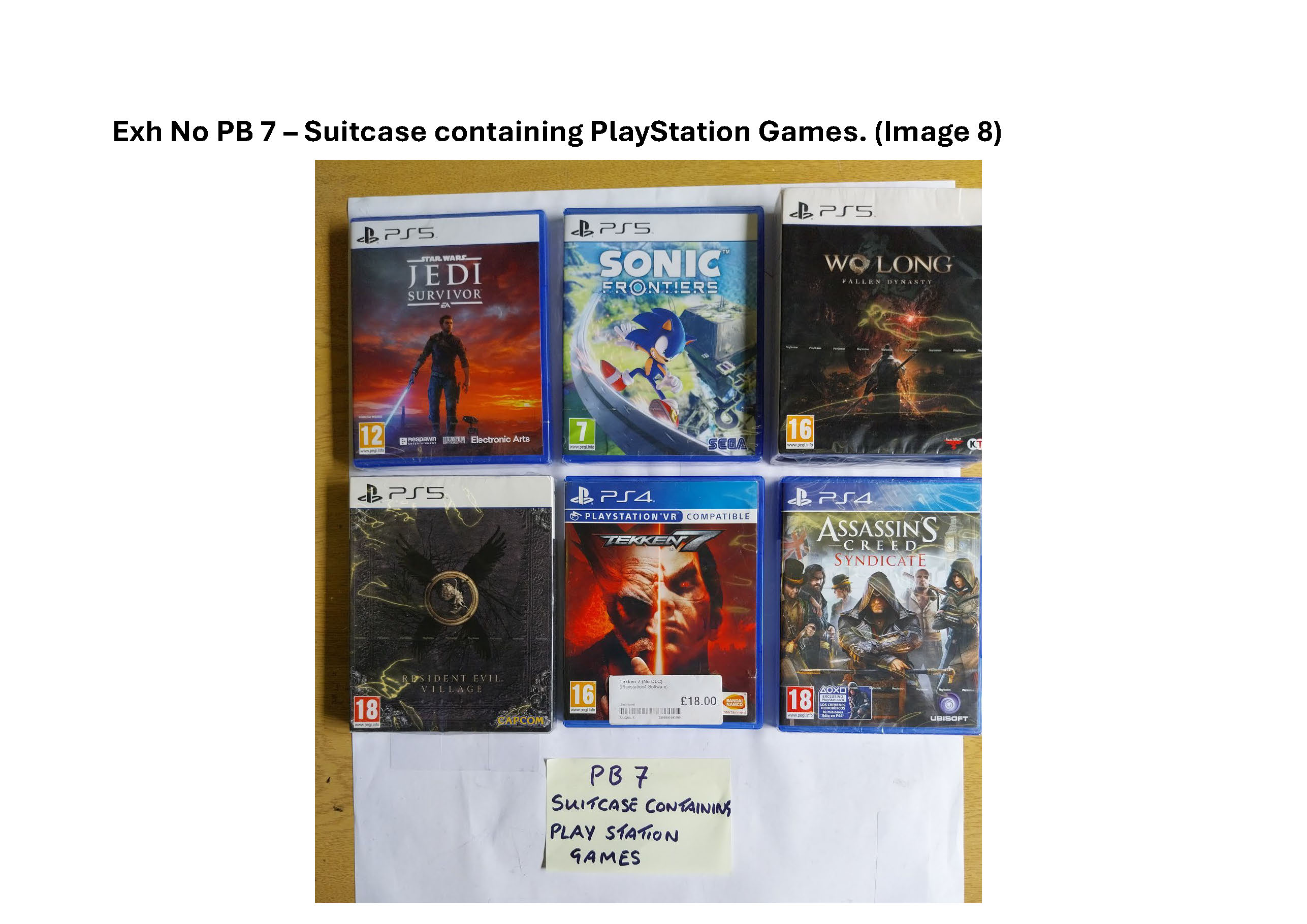 PB7 Suitcase containing Playstation games and controllers 7.jpg