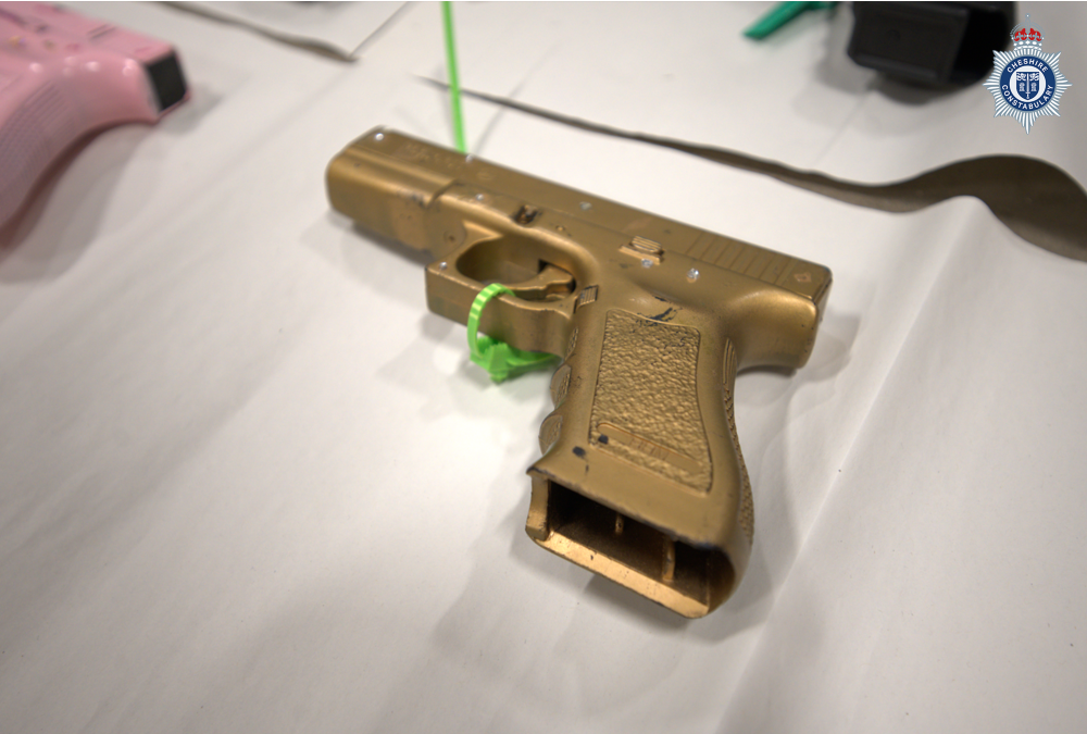 Op Pivot gold firearm